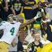 Michigan sophomore wide receiver Jeremy Gallon reaches for the ball to score a touchdown around Notre Dame cornerback Gary Gray during the fourth quarter against Notre Dame on Saturday.  Michigan beat Notre Dame 35-31. Melanie Maxwell I AnnArbor.com